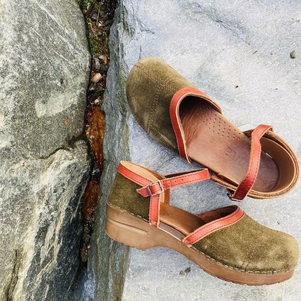 Sanita light green clogs, size 40. Slightly worn.